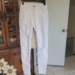 White Skinny High-Waisted Jeans with Distressed Details